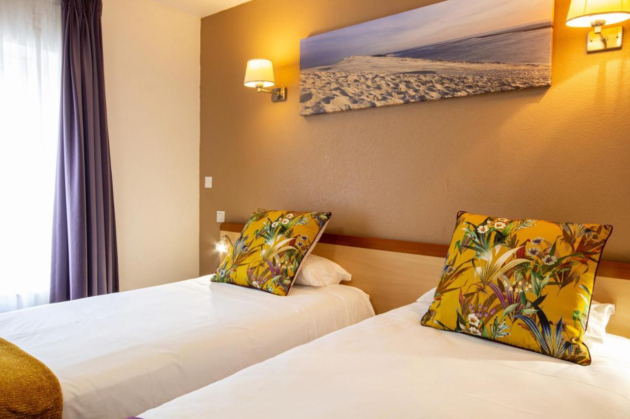 Cit'Hotel Le Commerce Saujon Bagian luar foto