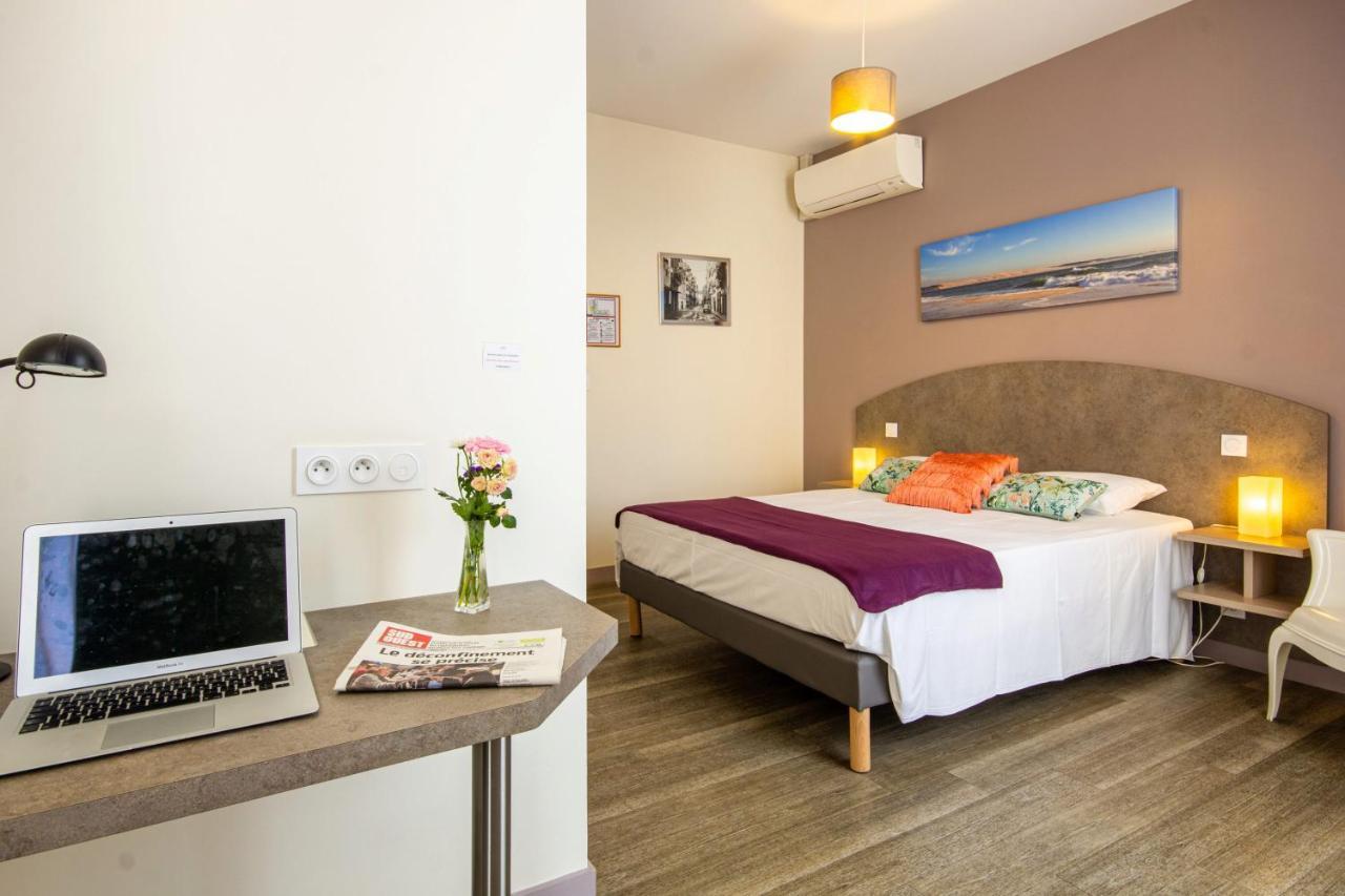 Cit'Hotel Le Commerce Saujon Bagian luar foto