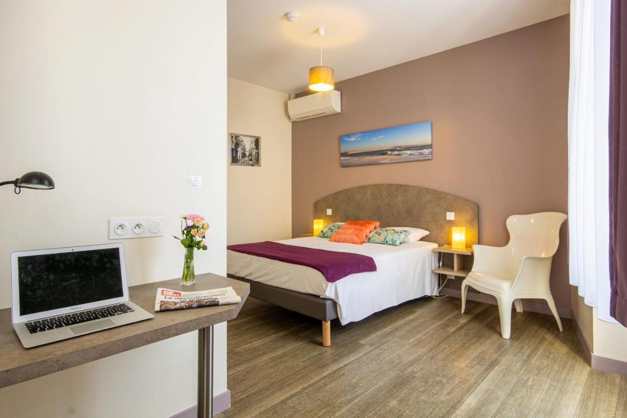 Cit'Hotel Le Commerce Saujon Bagian luar foto